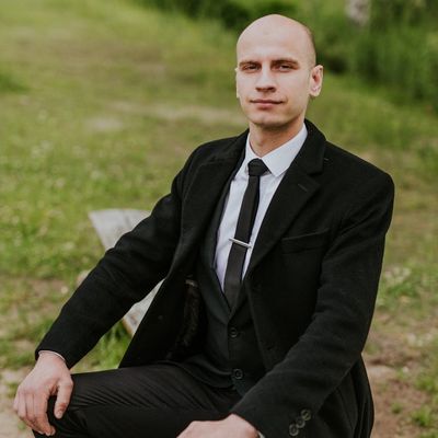 Confident male executive in business attire with professional demeanor